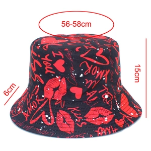 Detail showing bucket hat dimensions 56-58cm head circumference with heart graffiti print