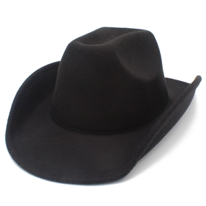 Close-up of black felt wool cowboy hat with curved brim and indented crown detail