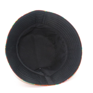 Detail view of double-sided bucket hat with black fabric lining and reinforced circular stitching