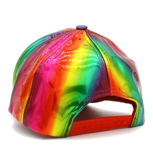 Detail view of rainbow holographic patent leather baseball cap with red plastic snapback