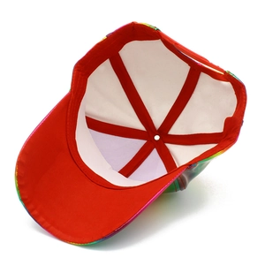 Inside view of colorful shiny patent leather baseball cap with red reinforcement bands