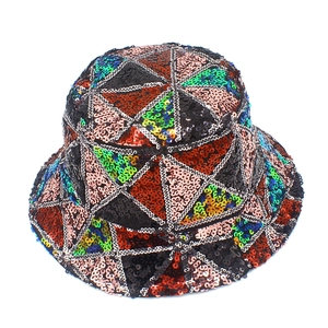 Close-up of multicolored sequins and geometric stitching on the punk bucket hat