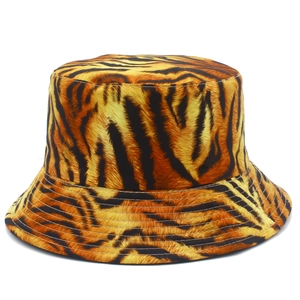 Reversible bucket hat with orange tiger print pattern and stitched brim for summer