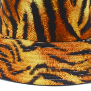 Macro view of tiger print bucket hat showing detailed fabric texture and reinforced stitching