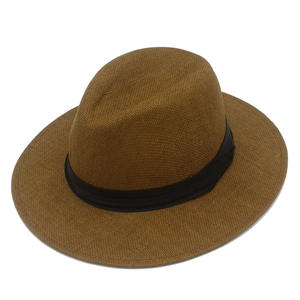 Classic caramel brown Panama straw hat with black ribbon for beach sun protection