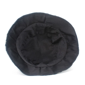 Detailed interior view of a black sequined bucket hat with fine knit texture and beads