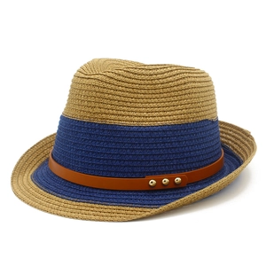 Two-tone woven fedora hat with brown leather band and gold rivet accents for sun protection