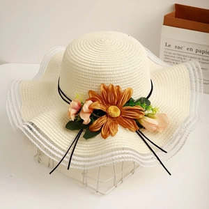 Elegant summer sun hat with floral decor and wavy lace brim for beach protection