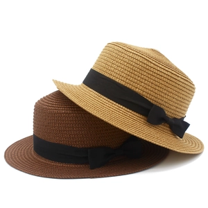 Cappelli di paglia a cima piatta con fiocchi neri in kaki e marrone per spiaggia estiva