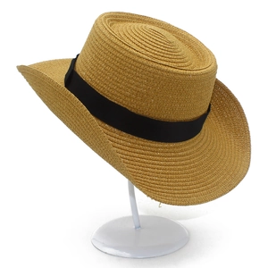 Classic flat top straw beach hat with black grosgrain ribbon for summer vacation sun protection