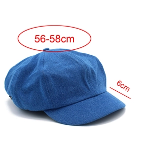 Detail view of denim newsboy cap with 56-58cm head size and 6cm brim dimensions