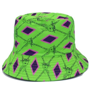 Detail of green bucket hat with purple diamond pattern and cute cartoon rabbit print