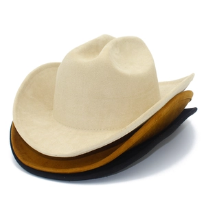 Three western cowboy hats in beige, brown, and black stacked on a white background