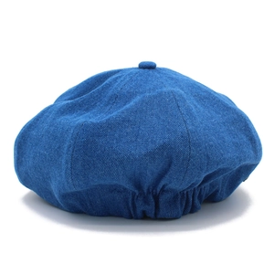 Classic dark blue denim octagonal newsboy cap with vintage stitching and adjustable back band