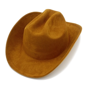 Detailed view of brown suede cowboy hat with classic pinched crown and wide brim