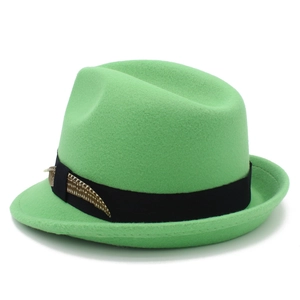 Detailed view of green felt fedora featuring a black ribbon band and decorative feather