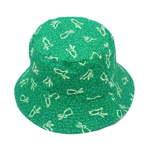Detail of green fisherman hat with cute rabbit pattern and reinforced brim stitching