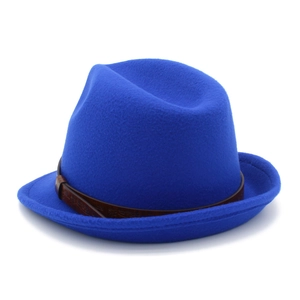 Detail of royal blue wool fedora hat featuring a brown embossed leather decorative band