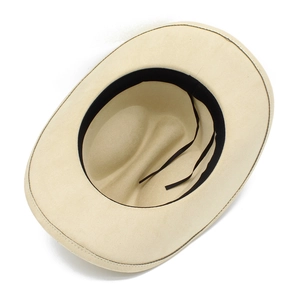 Detail of western cowboy hat interior featuring black sweatband and adjustable drawstring