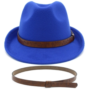 Close-up of royal blue fedora hat with detachable embossed brown leather band detail
