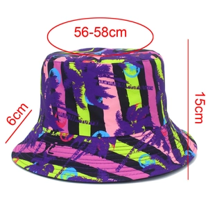 Detail showing tropical palm tree print bucket hat dimensions with 56-58cm head circumference