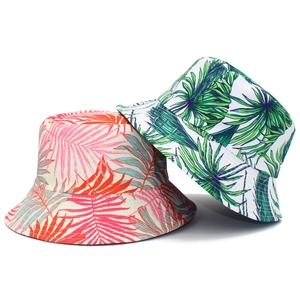Foldable tropical leaf print bucket hat for women with sun protection and stylish design