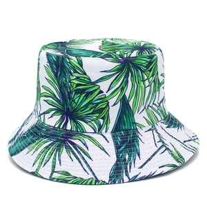 Summer foldable sun hat for women with green tropical palm leaf print on white canvas