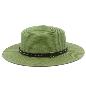 Detail of avocado green straw hat featuring black belt with gold studs and ring buckle