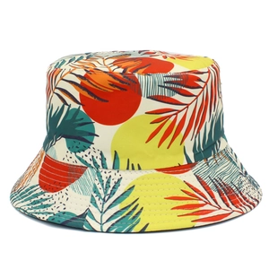 Pastel floral bucket hat with colorful leaf print, foldable sun protection for women