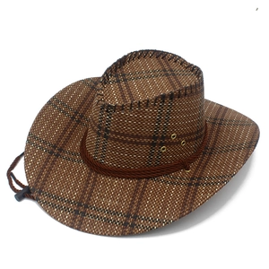 Close-up of brown woven cowboy hat texture with metal eyelets and decorative rope