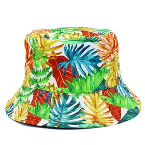 Close-up of tropical leaf print and reinforced stitching on foldable bucket hat brim