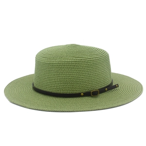 Detail of light green straw hat with woven texture, black leather band, and gold studs