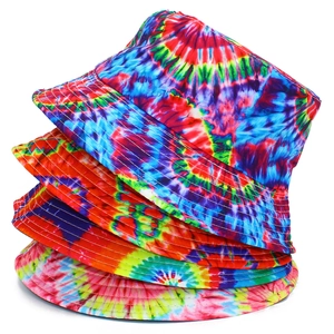 Detailed stack of vibrant tie-dye bucket hats showcasing colorful breathable fabric patterns
