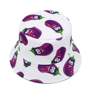 Detailed close-up of white bucket hat fabric with cute cartoon eggplant patterns and texture