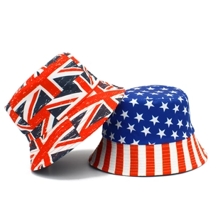 Detail of bucket hats with artistic British Union Jack and USA flag prints on canvas fabric