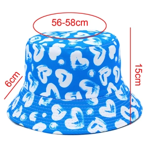 Blue heart print bucket hat detail showing 56-58cm head circumference and dimensions