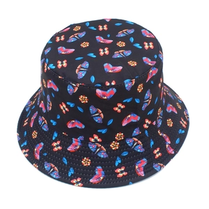 Fashionable black bucket hat with vibrant colorful butterfly and flower prints for sun protection