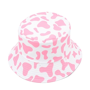 Close-up of pink cow print bucket hat featuring high-quality canvas fabric and reinforced stitching