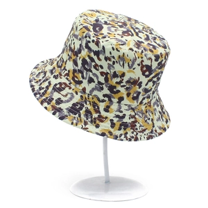 Stylish reversible leopard print bucket hat for sun protection with purple and brown pattern