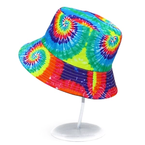 Close-up of a tie-dye bucket hat featuring vibrant multi-color swirls and neat brim stitching