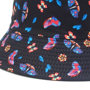 Close-up of colorful butterfly prints and reinforced stitching on black bucket hat brim