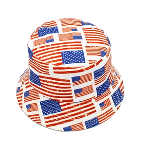 Detail shot of a canvas bucket hat featuring an all-over American flag stars and stripes print