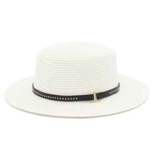 Detail of white straw boater hat with black leather strap and metallic stud accents