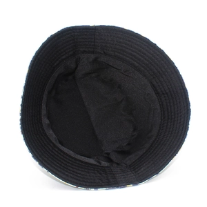 Detail shot of the inner black fabric and parallel stitching on the leopard bucket hat