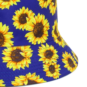 Close-up of sunflower patterns on navy cotton bucket hat with detailed stitching