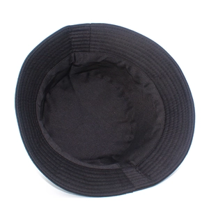 Detailed top view of black cotton bucket hat showing parallel brim stitching and structure