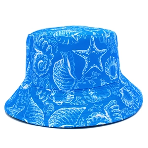 Blue cotton bucket hat with white sea shell and starfish patterns for outdoor sun protection