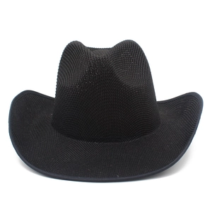 Close-up of black breathable mesh texture on the brim of a vintage western cowboy hat