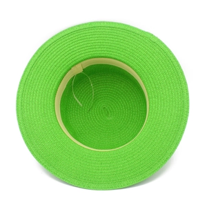 Detail view of fluorescent green straw sun hat showing inner sweatband and adjustable drawstring