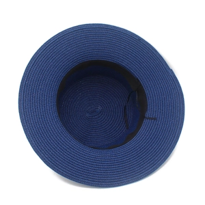 Detail view of navy blue straw hat interior featuring sweatband and adjustable drawstring
